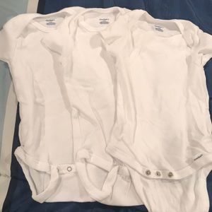 Three White short sleeved onesies 6-9 months!